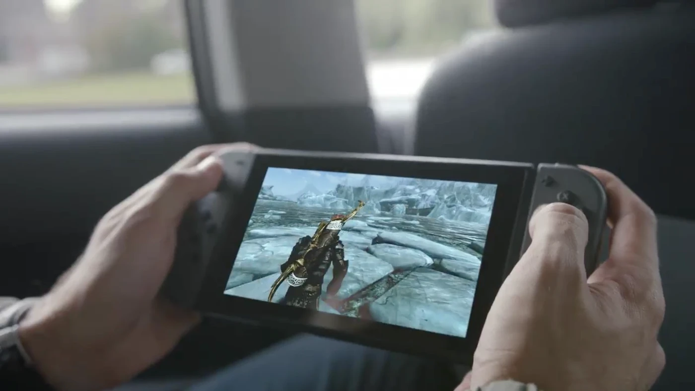 Person playing a game on the handheld Nintendo Switch